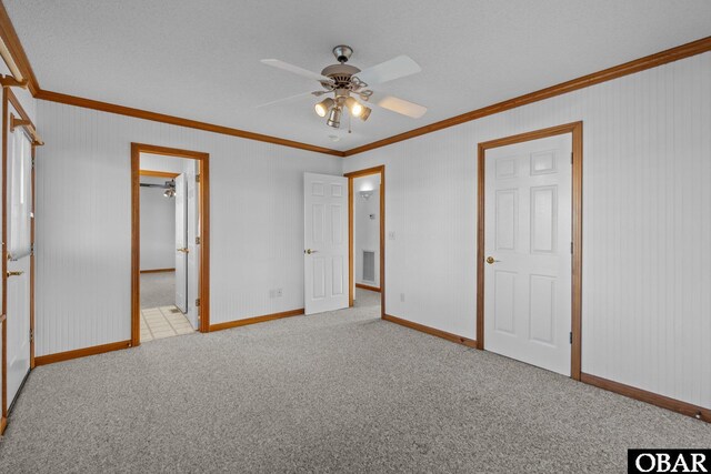 50096 Freebooter Ct Lot 178, Frisco, NC 27936 - unfurnished bedroom featuring ornamental molding, light colored carpet, visible vents, and baseboards