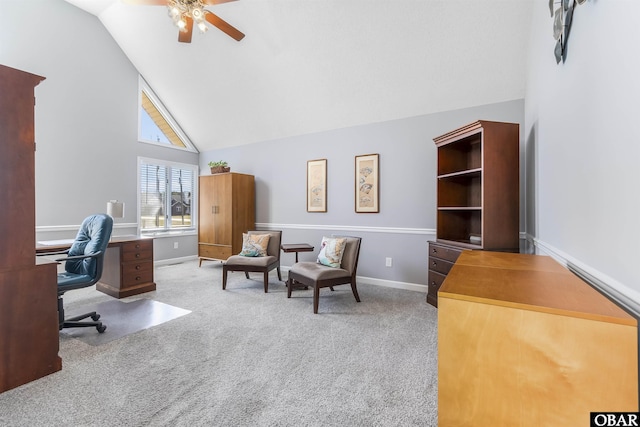 carpeted office featuring baseboards, high vaulted ceiling, and a ceiling fan