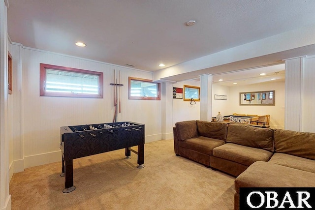 recreation room with recessed lighting, light carpet, and baseboards