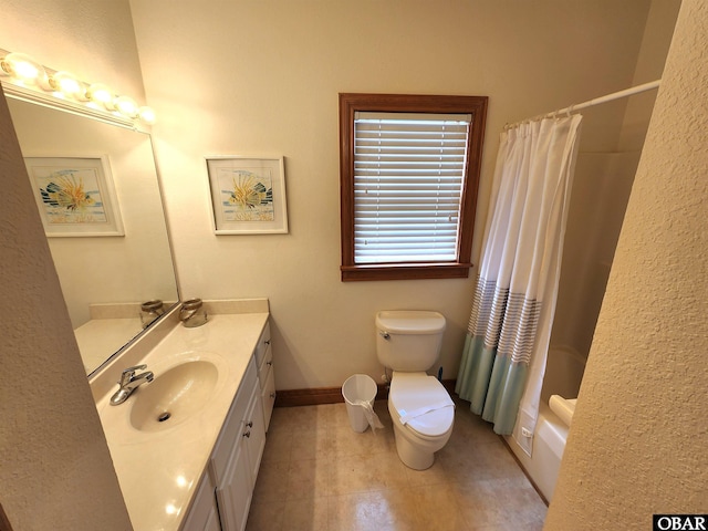 full bathroom featuring shower / tub combo with curtain, baseboards, toilet, vanity, and tile patterned flooring