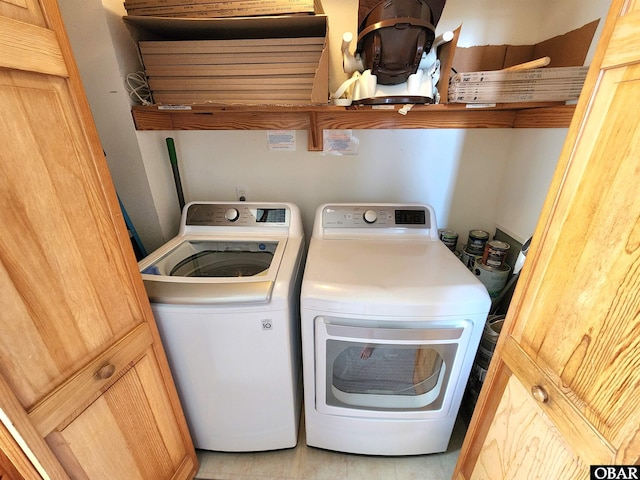 washroom with washer and dryer and laundry area