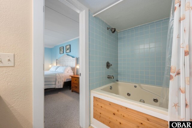 8123 S Old Oregon Inlet Rd Unit 208, Nags Head, NC 27959 - ensuite bathroom with a combined bath / shower with jetted tub and a textured wall