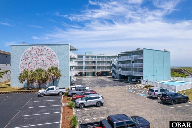 8123 S Old Oregon Inlet Rd Unit 208, Nags Head, NC 27959 - view of property featuring uncovered parking