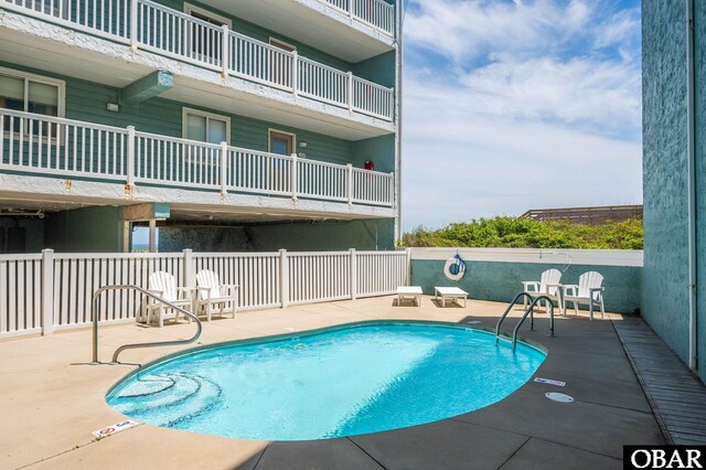 8123 S Old Oregon Inlet Rd Unit 208, Nags Head, NC 27959 - community pool with a patio