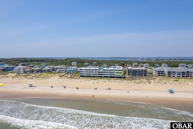 8123 S Old Oregon Inlet Rd Unit 208, Nags Head, NC 27959 - bird's eye view of waterfront with a beach