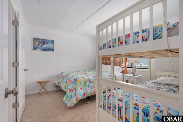 8123 S Old Oregon Inlet Rd Unit 208, Nags Head, NC 27959 - carpeted bedroom featuring baseboards and crown molding