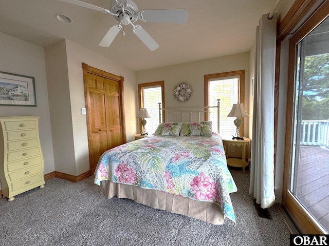 bedroom featuring ceiling fan, carpet, and baseboards