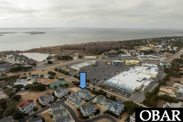 drone / aerial view with a water view