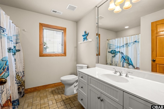 full bathroom featuring toilet, baseboards, and visible vents