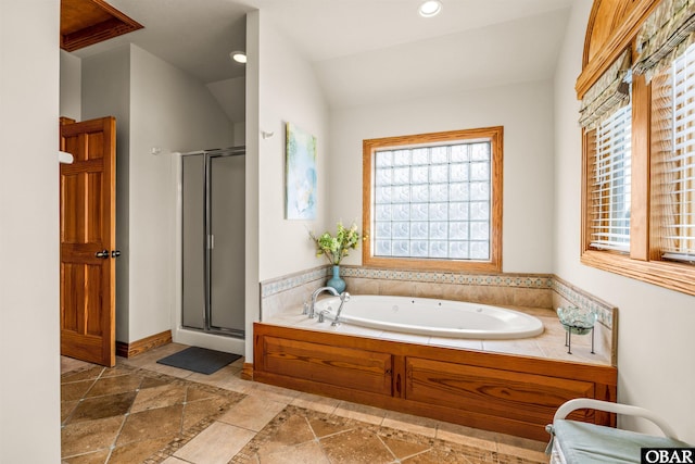 full bath with a stall shower, lofted ceiling, recessed lighting, and a bath