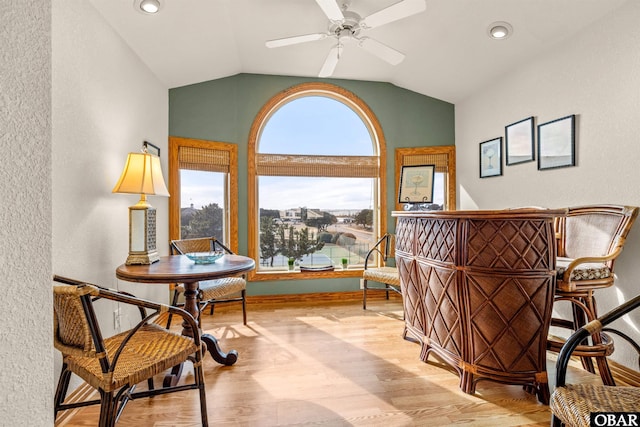 living area featuring ceiling fan, recessed lighting, vaulted ceiling, and wood finished floors