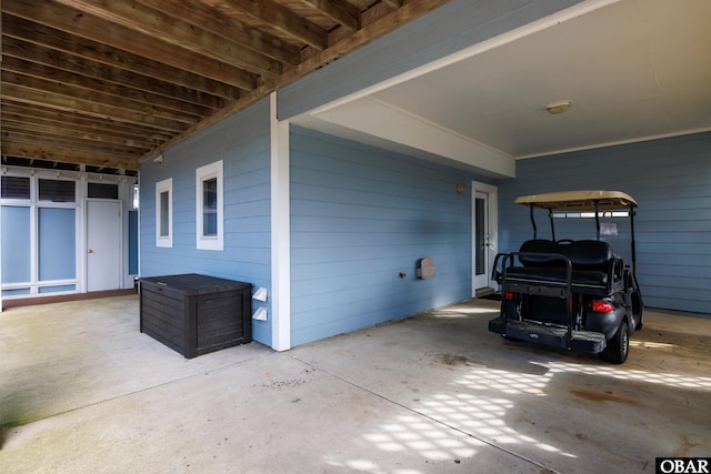 exterior space featuring a carport