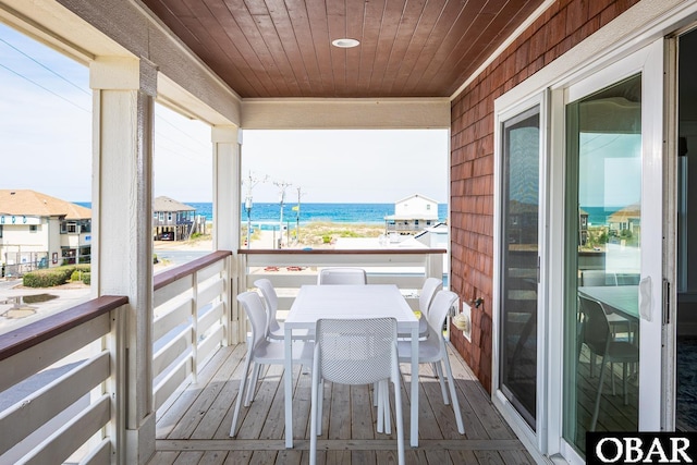 205 E Eckner St Lot # 17, Kitty Hawk, NC 27949 - balcony with outdoor dining space and a water view