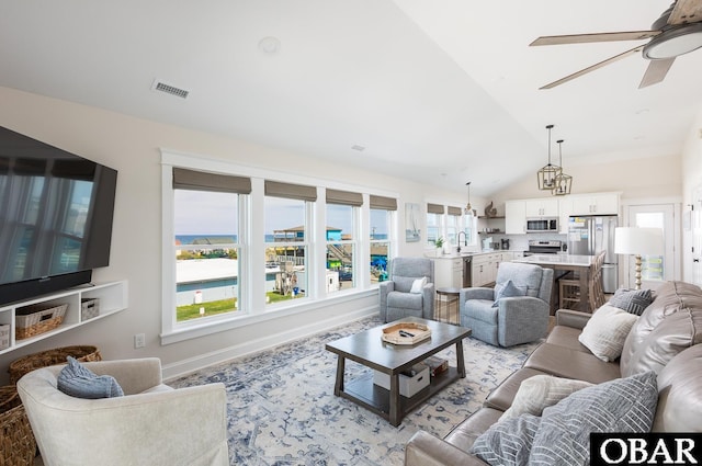 205 E Eckner St Lot # 17, Kitty Hawk, NC 27949 - living room with vaulted ceiling and ceiling fan