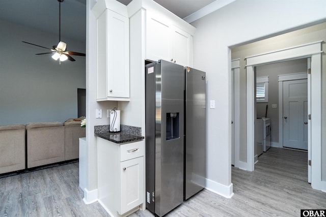 102 Keeter Barn Rd, Camden, NC 27976 - kitchen featuring ceiling fan, white cabinetry, stainless steel refrigerator with ice dispenser, light wood-type flooring, and separate washer and dryer