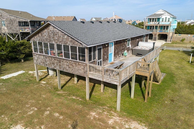23180 Wimble Shores Dr Lot 8, Rodanthe, NC 27968 - rear view of property with a hot tub, a shingled roof, a wooden deck, a sunroom, and a yard