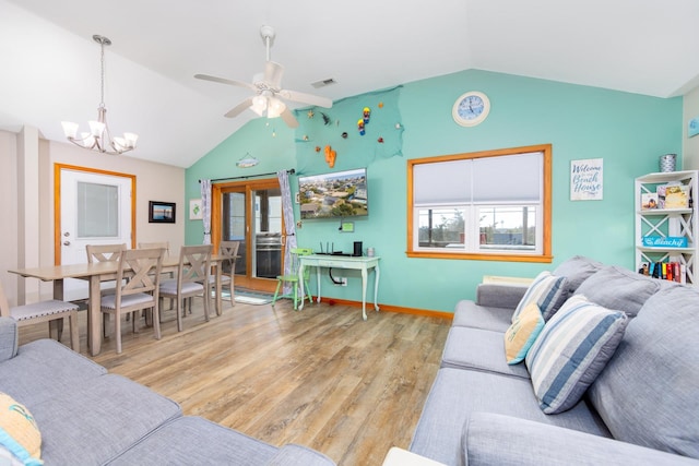 23180 Wimble Shores Dr Lot 8, Rodanthe, NC 27968 - living area featuring vaulted ceiling, a chandelier, light wood finished floors, ceiling fan, and baseboards