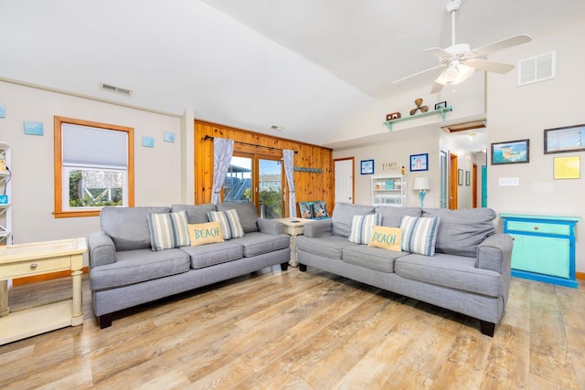 23180 Wimble Shores Dr Lot 8, Rodanthe, NC 27968 - living room featuring vaulted ceiling, healthy amount of natural light, wood finished floors, wood walls, and a ceiling fan