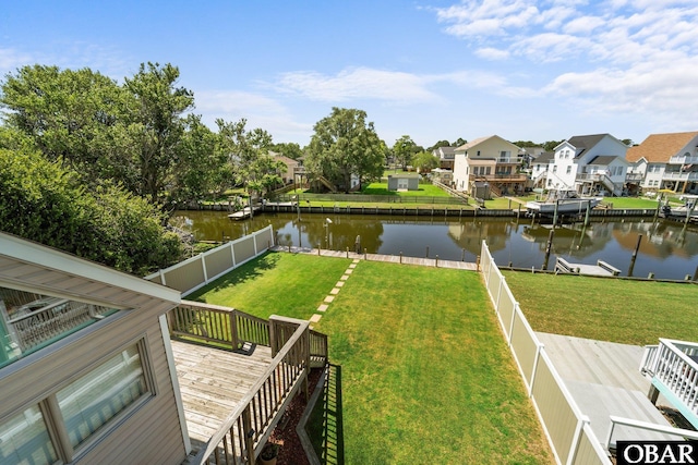 117 Broadbay Dr Lot 119, Kill Devil Hills, NC 27948 - fenced backyard featuring a deck with water view and a residential view