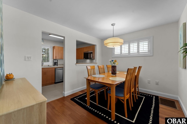 117 Broadbay Dr Lot 119, Kill Devil Hills, NC 27948 - dining room featuring wood finished floors and baseboards