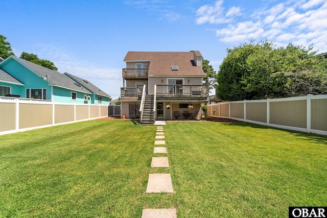 117 Broadbay Dr Lot 119, Kill Devil Hills, NC 27948 - rear view of property featuring stairway, a fenced backyard, a deck, and a patio