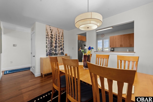 117 Broadbay Dr Lot 119, Kill Devil Hills, NC 27948 - dining space with dark wood-style floors and baseboards
