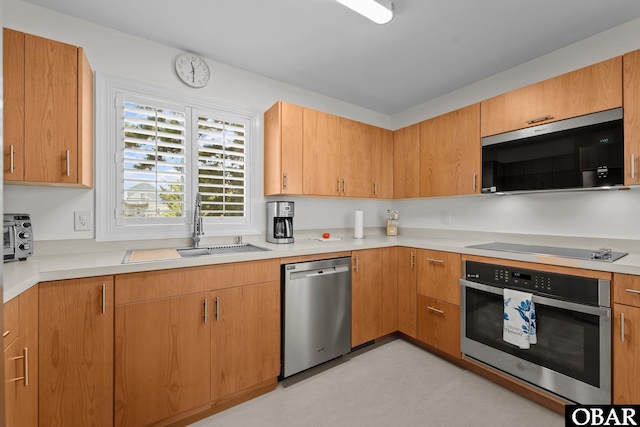 117 Broadbay Dr Lot 119, Kill Devil Hills, NC 27948 - kitchen with appliances with stainless steel finishes and light countertops