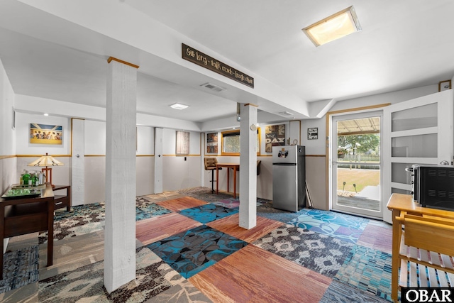 117 Broadbay Dr Lot 119, Kill Devil Hills, NC 27948 - kitchen featuring freestanding refrigerator and wood finished floors