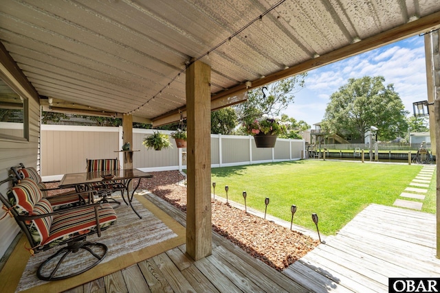 117 Broadbay Dr Lot 119, Kill Devil Hills, NC 27948 - deck featuring a fenced backyard and outdoor dining area