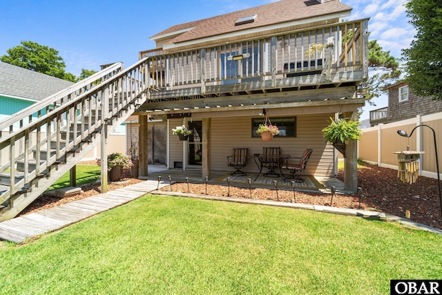 117 Broadbay Dr Lot 119, Kill Devil Hills, NC 27948 - back of property featuring a deck, a patio, stairs, and a shingled roof