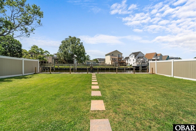 117 Broadbay Dr Lot 119, Kill Devil Hills, NC 27948 - fenced backyard featuring a water view