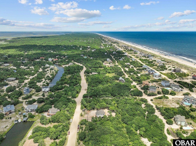 aerial view with a view of the beach and a water view