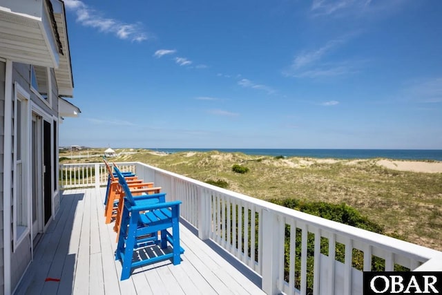 deck featuring a water view