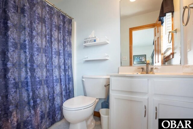 full bathroom with vanity and toilet