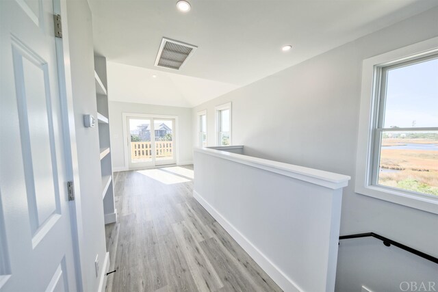 56185 Cedar Ave Lot 5, Hatteras, NC 27943 - hall featuring recessed lighting, an upstairs landing, visible vents, and a healthy amount of sunlight