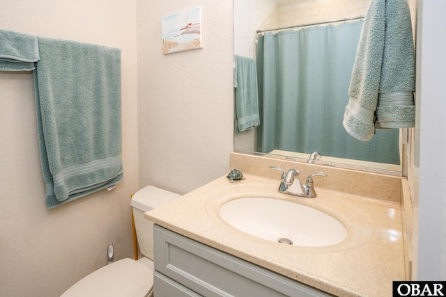 100A Mercedes Ct Unit A, Grandy, NC 27939 - full bathroom featuring toilet, vanity, and a shower with curtain