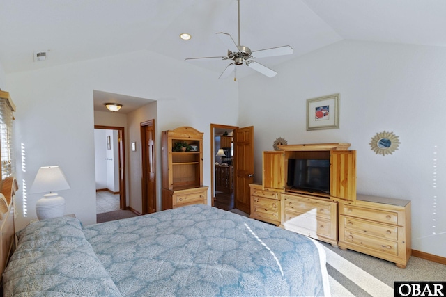 bedroom featuring vaulted ceiling, a ceiling fan, and baseboards