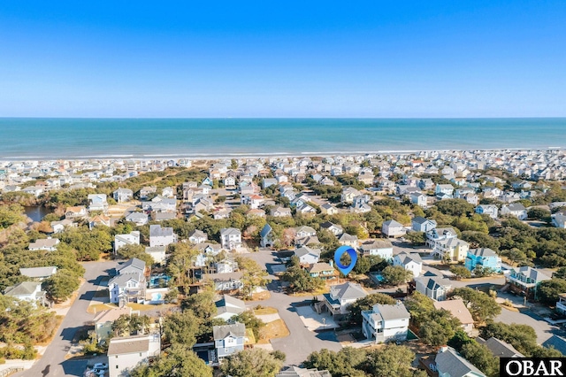 aerial view with a water view and a residential view