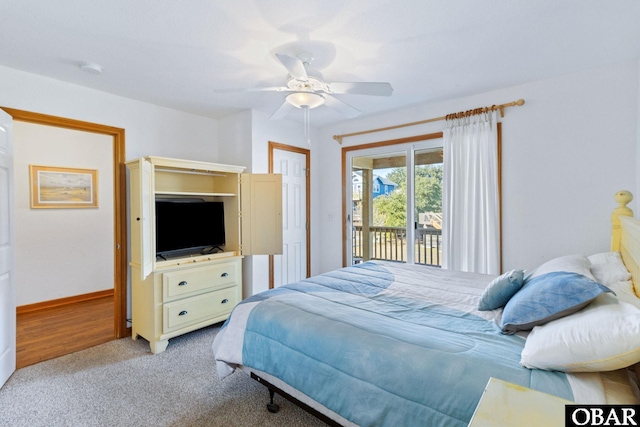 bedroom featuring light carpet, ceiling fan, baseboards, and access to exterior