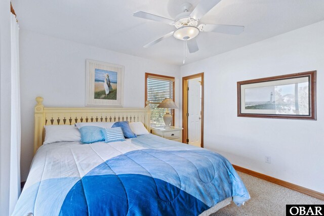 bedroom featuring ceiling fan, carpet, and baseboards