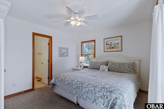 bedroom featuring light carpet, ceiling fan, and baseboards