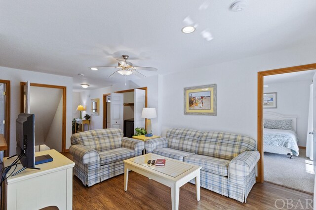 living area featuring recessed lighting, ceiling fan, and wood finished floors