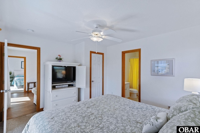 bedroom featuring connected bathroom and ceiling fan