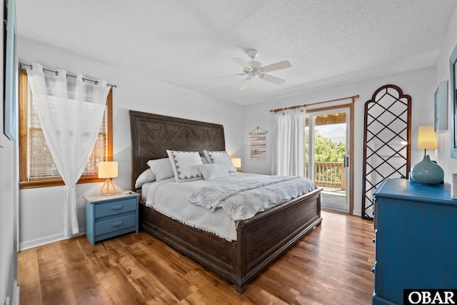 bedroom with access to outside, a ceiling fan, a textured ceiling, and wood finished floors