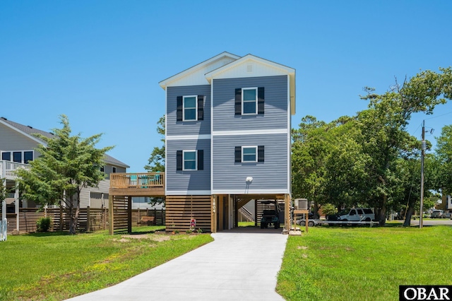 1804 Harbour View Dr Lot 91-O, Kill Devil Hills, NC 27948 - coastal inspired home with a carport, stairway, concrete driveway, and a front yard