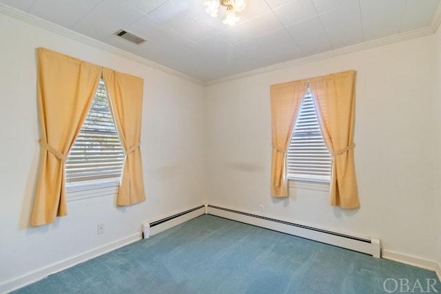 spare room with carpet floors, visible vents, a baseboard heating unit, and crown molding