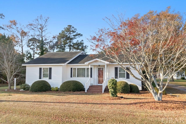 ranch-style house with a front yard