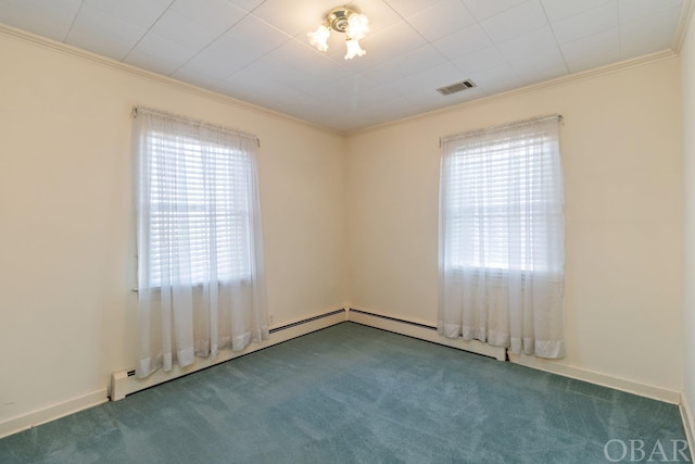 empty room featuring ornamental molding, carpet flooring, and visible vents