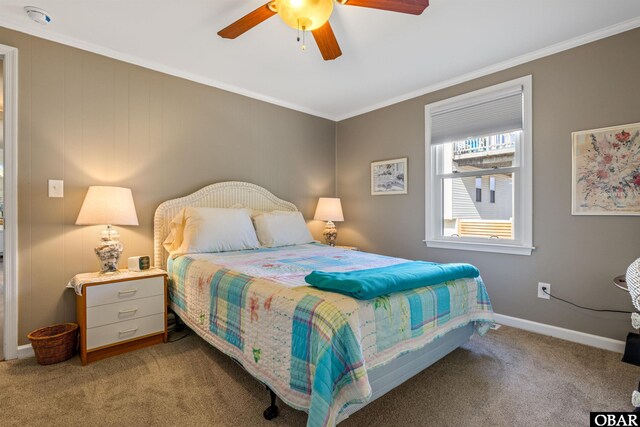 bedroom with light carpet, baseboards, ornamental molding, and ceiling fan