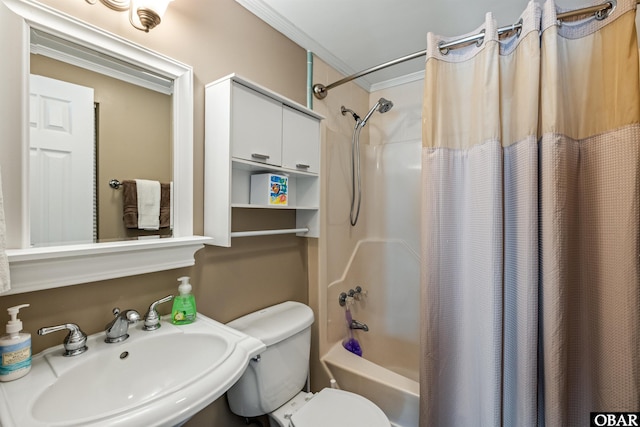 full bathroom featuring toilet, ornamental molding, a sink, and shower / tub combo with curtain